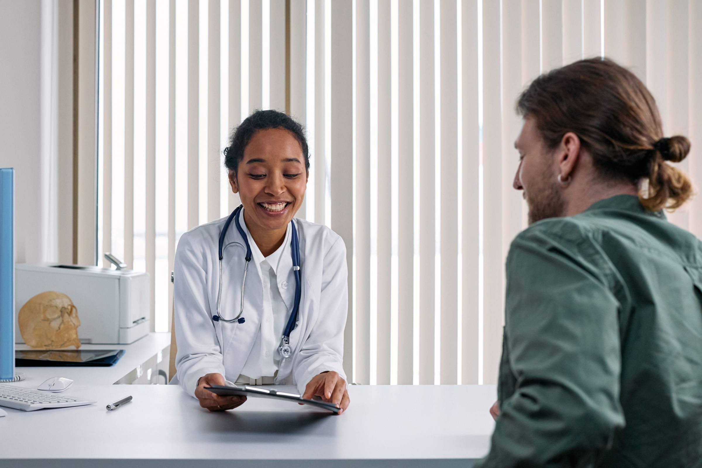 Doctor holding a private consultation with a patient
