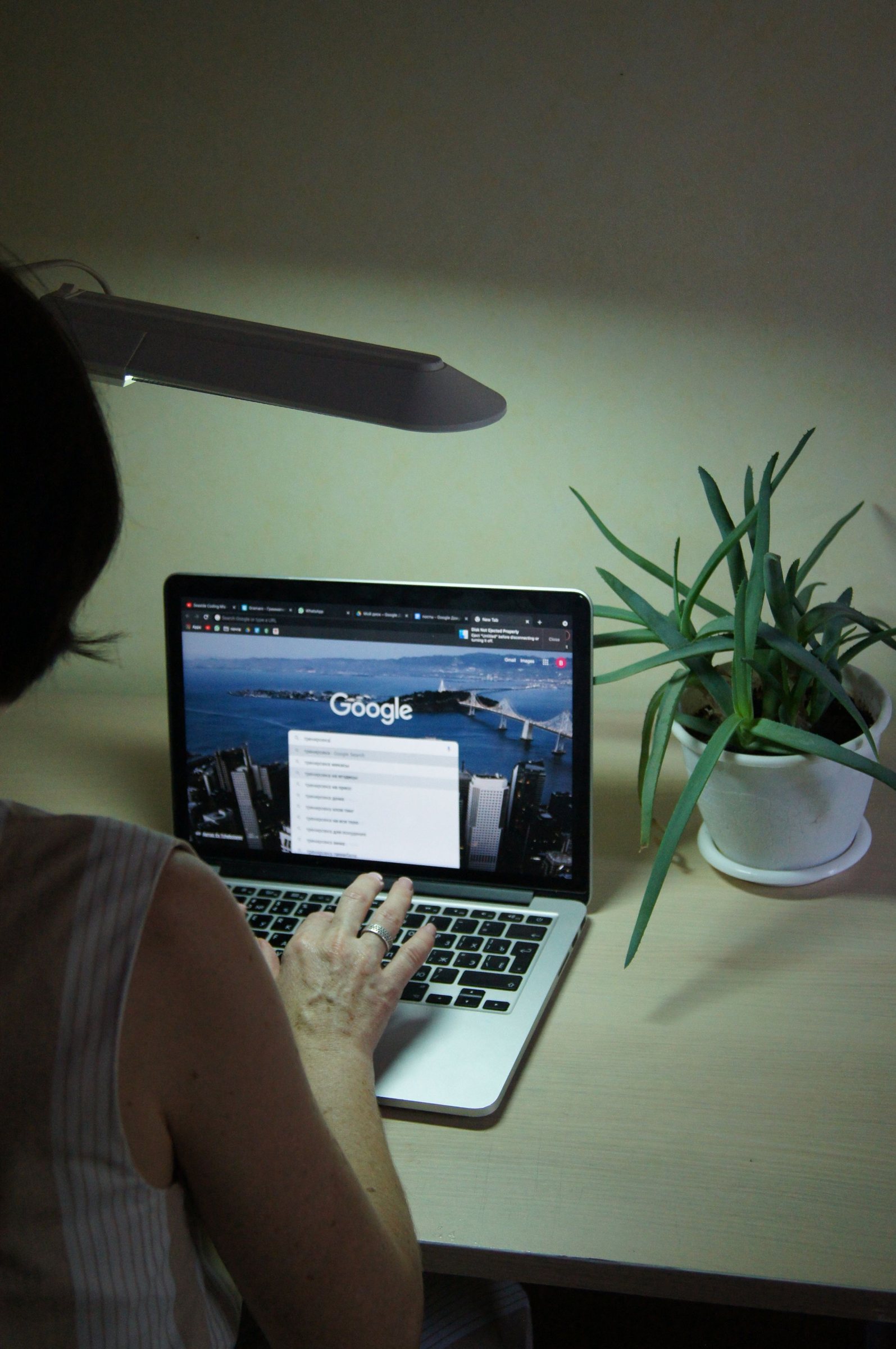 Person researching an answer with Google search